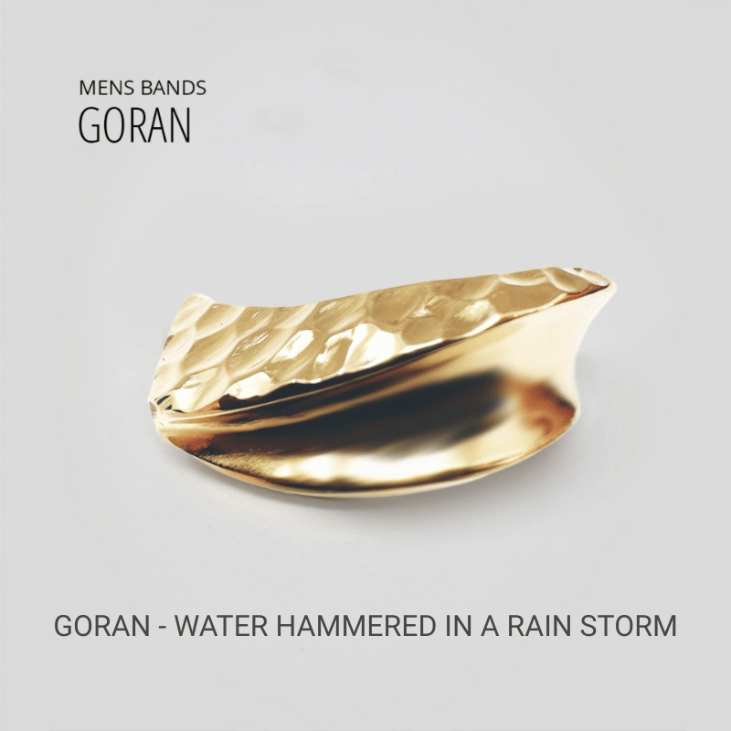 Men's band Goran - Water hammered in a rain storm